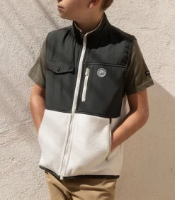 CRUMB - Mouwloze jas met ritssluiting, opstaande kraag en contrasterende inzetstukken