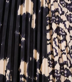 Geplooide rok tot halverwege de lengte in blauw en beige print