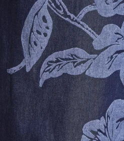 Ruimvallende blauwe jumpsuit met bloemenprint en bandjes